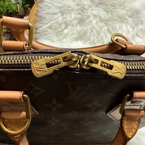 Louis Vuitton Monogram Alma Handbag - Picture 6 of 16